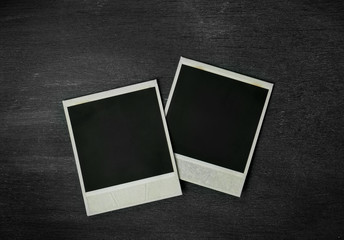 Photo frame of polaroid on black background.