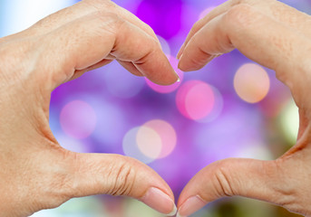 hands in the form of heart