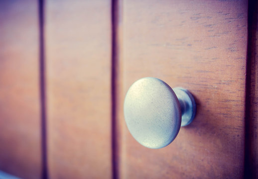 Metal Knob On Wood Drawer 