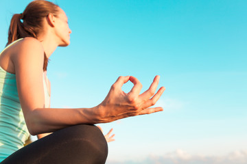 Fototapeta na wymiar Young healthy woman practicing yoga. 