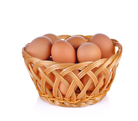 egg in basket wicker on white background
