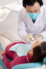 Patient receiving treatment in dental clinic