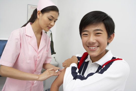 Nurse Injecting Boy 