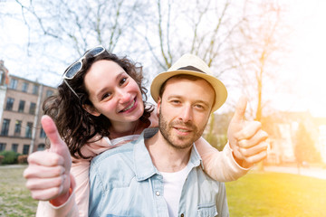 Young couple on holidays taking selfie