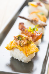 omelet with spicy pork sushi