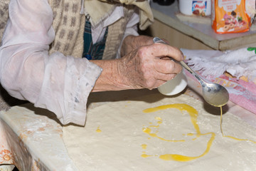 Grandmother making puff pastry