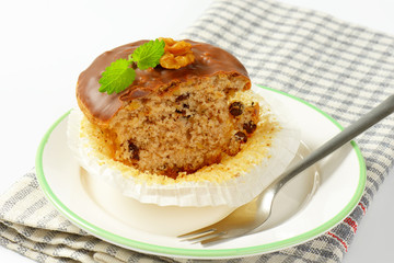 Chocolate glazed walnut muffin