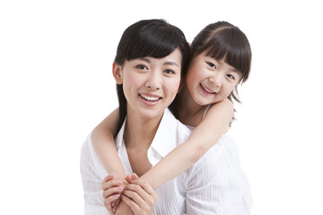 Portrait of mother and daughter