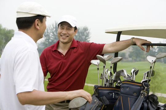 Portrait of Two Golfers