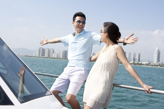 Couple Relaxing on a Yacht