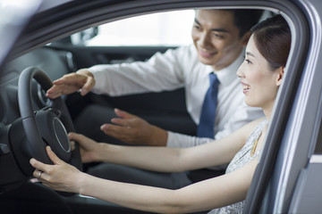 Young woman taking a test drive