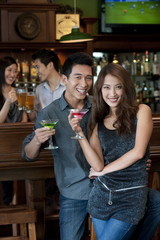 Couple Enjoying Cocktails Together