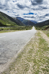 Road and mountains in Tibet, China