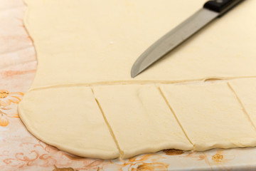 Cutting puff pastry for frying