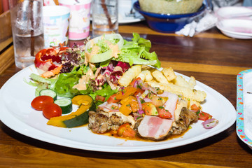 Barbecued Pork with Grilled Vegetables and fruit
