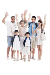 Young family in travel waving