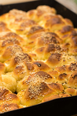 Fresh and hot baked rolls on the plate