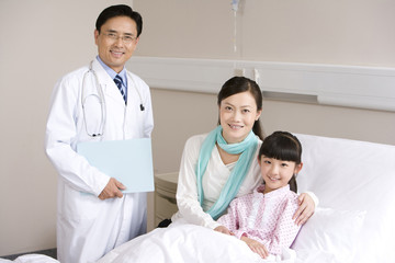 Portrait of a girl, her mother, and her doctor