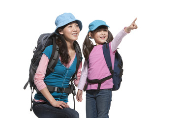 Portrait of mother and daughter travelling