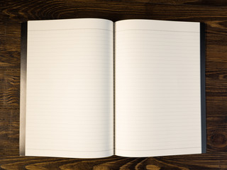 notebook on wooden table