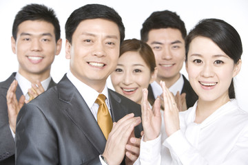 Business people clapping