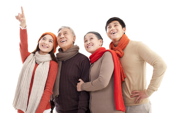 Family members looking afar and pointing the front 
