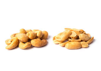 salted and roasted cashew nuts and salted peanuts on white