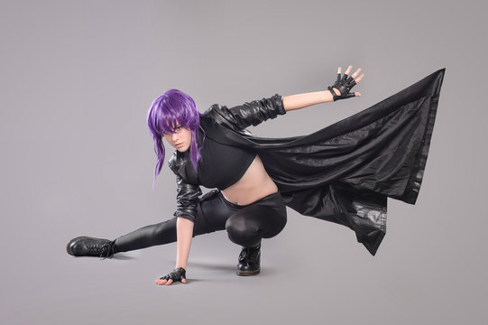 Woman with gun / Portrait of sexy woman posing in studio with gun