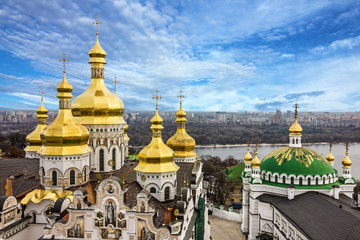 Fototapeta na wymiar Kiev, Ukraine. Cupolas of Pechersk Lavra Monastery and river Dni