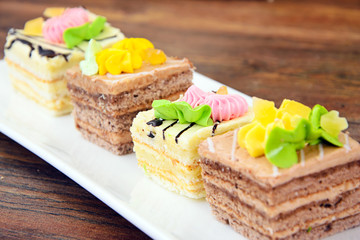 Sweets: Cream Cakes on Plate