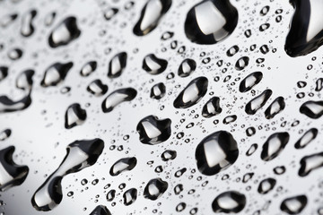 Fototapety  krople wody na powierzchni ze stali nierdzewnej