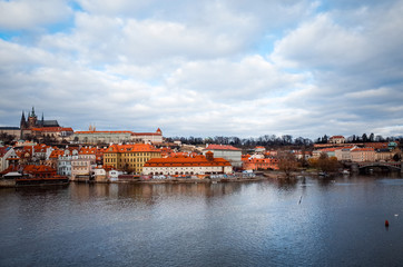 Fototapeta na wymiar Old Town ancient architecture and river pier in Prague, Czech Re