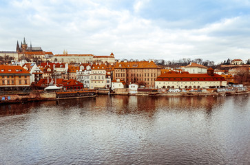 Old Town ancient architecture and river pier in Prague, Czech Re