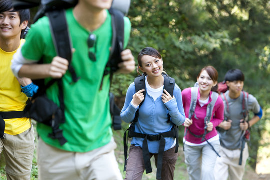 Young people hiking in mountain