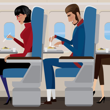 People have lunch on the plane - in-flight meal concept