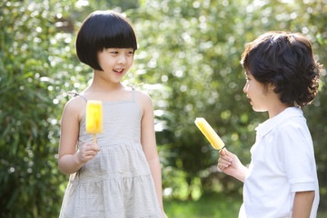 Children and popsicle