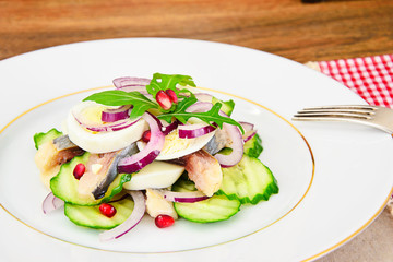 Dietary Food: Salad with Herring, Cucumber, Egg and Onion