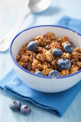 homemade healthy granola with blueberry for breakfast