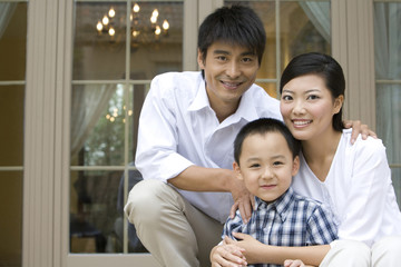 Portrait of a family of three