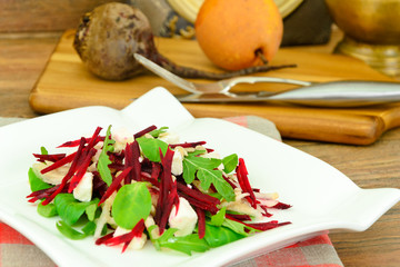 Salad of Raw Beets, Pears, Arugula, Roots, Sunflower Seeds and C