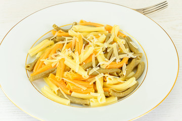 Pasta. Colorful Noodles on Plate.