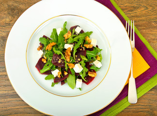 Salad of Raw Beets, Pears, Arugula, Roots, Sunflower Seeds and C