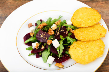 Salad of Raw Beets, Pears, Arugula, Roots, Sunflower Seeds and C