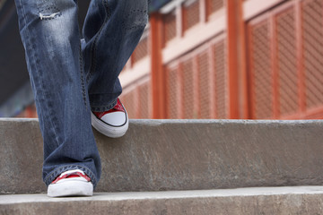 Person Descending Stairs, Close-Up Of Legs