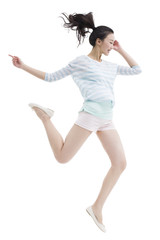 Happy young woman jumping