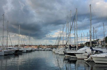 Obraz na płótnie Canvas Port of Rovinj in the summer cloudy day
