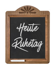 Obraz premium Kreidetafel mit der Beschriftung Heute Ruhetag