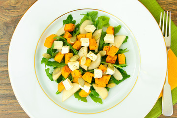 Healthy and Diet Food: Salad, Pumpkin, Pear, Cheese and Seeds