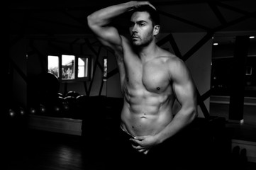 Fototapeta na wymiar Sexy, attractive muscular man black and white