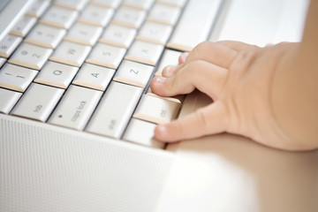Infant with laptop